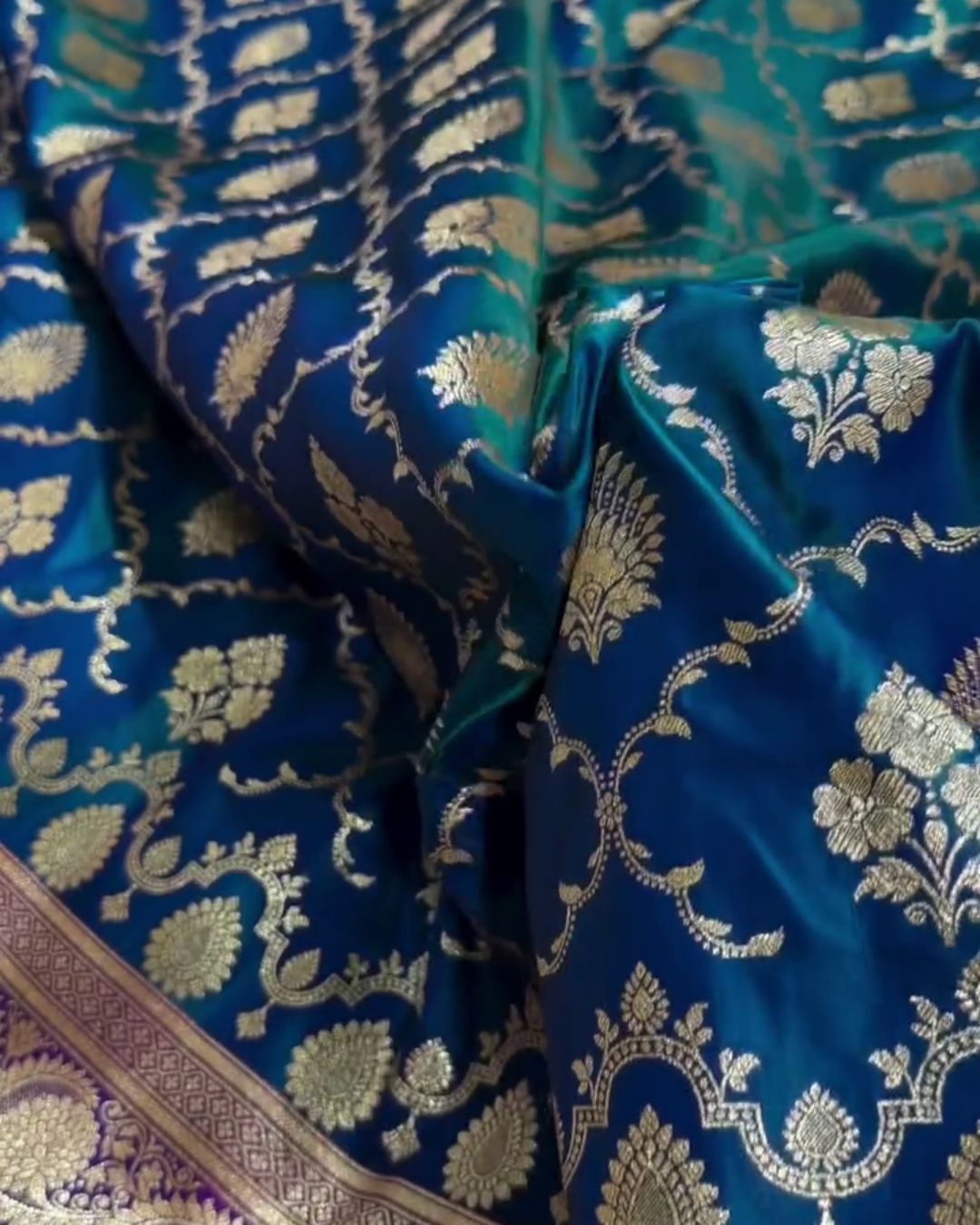 Mahika-Teal Banarasi Satin Saree with Zari Floral & Contrast Maroon Border