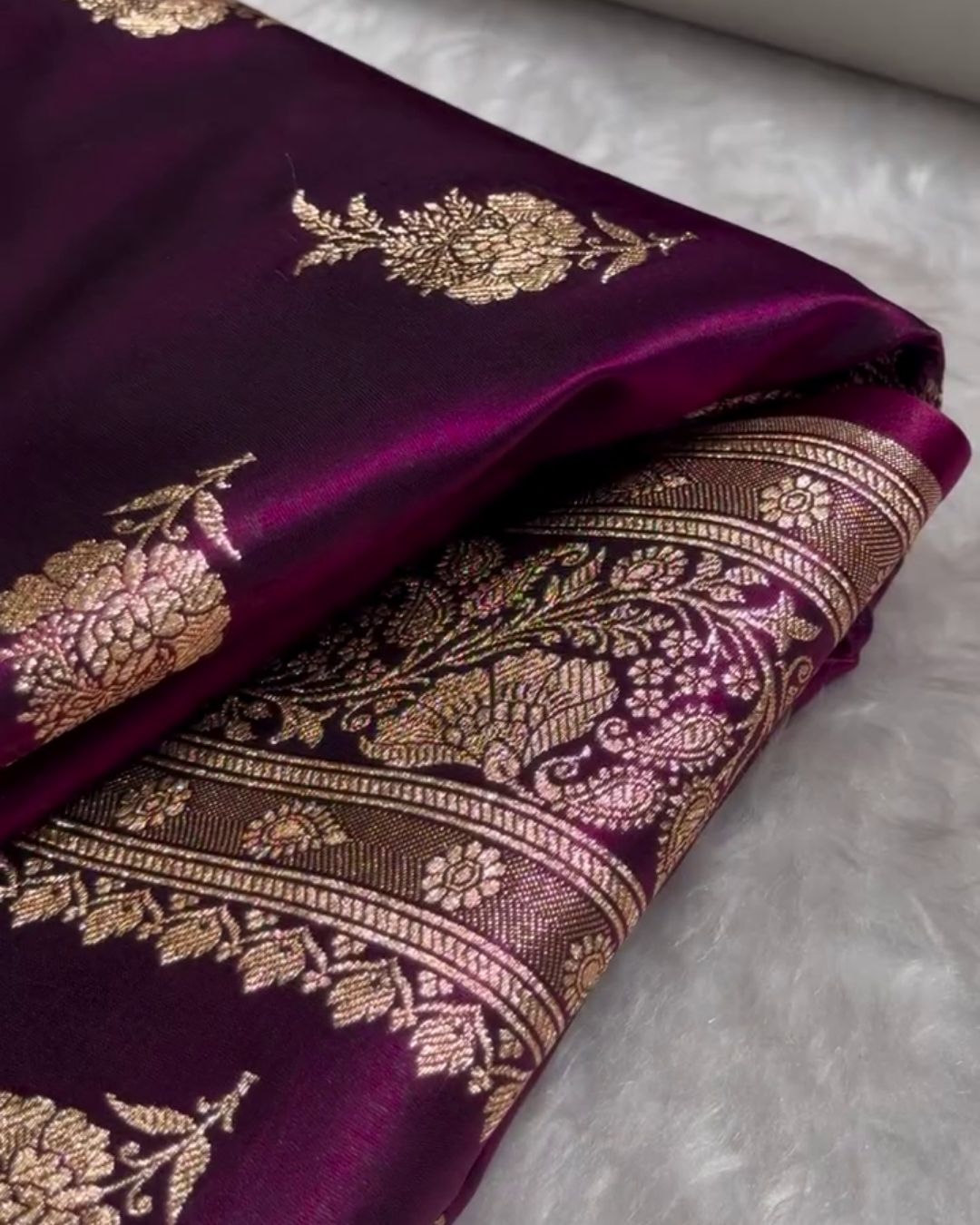 Satyabhama – Plum Satin Saree with Golden Zari Floral Weave