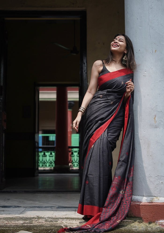 Charcoal Black Cotton Saree with Maroon Border & Subtle Motifs