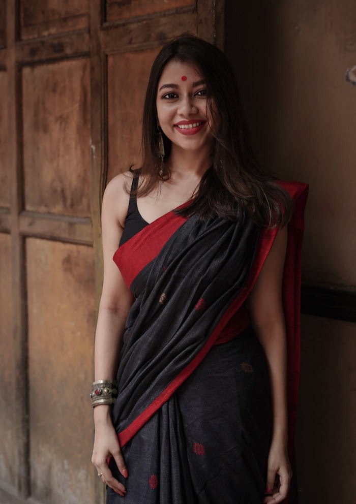Charcoal Black Cotton Saree with Maroon Border & Subtle Motifs