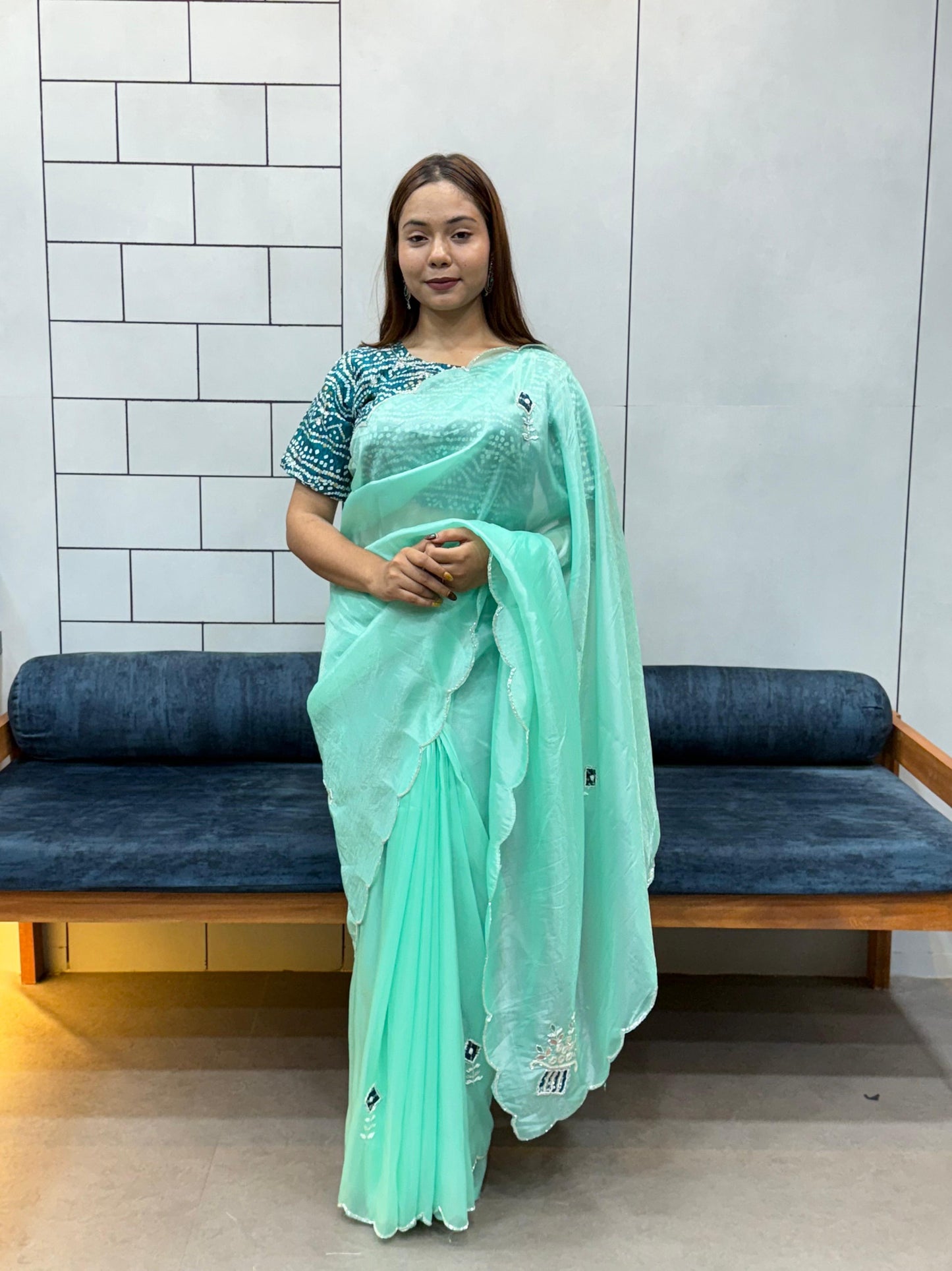 Suhani Sky Blue Chiffon Saree with Red Bandhej Blouse