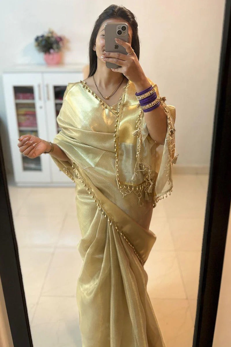 Savitri – Golden Tissue Silk Saree with Zari Weaving and Lace Work
