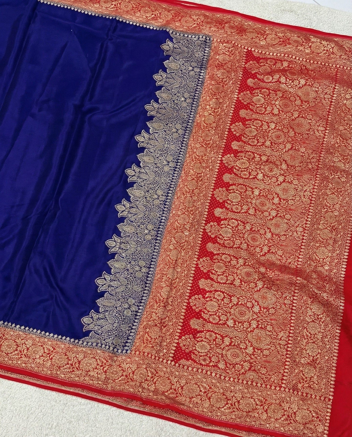 Arati - Blue Red Pure Crape Silk Saree with Zari Border