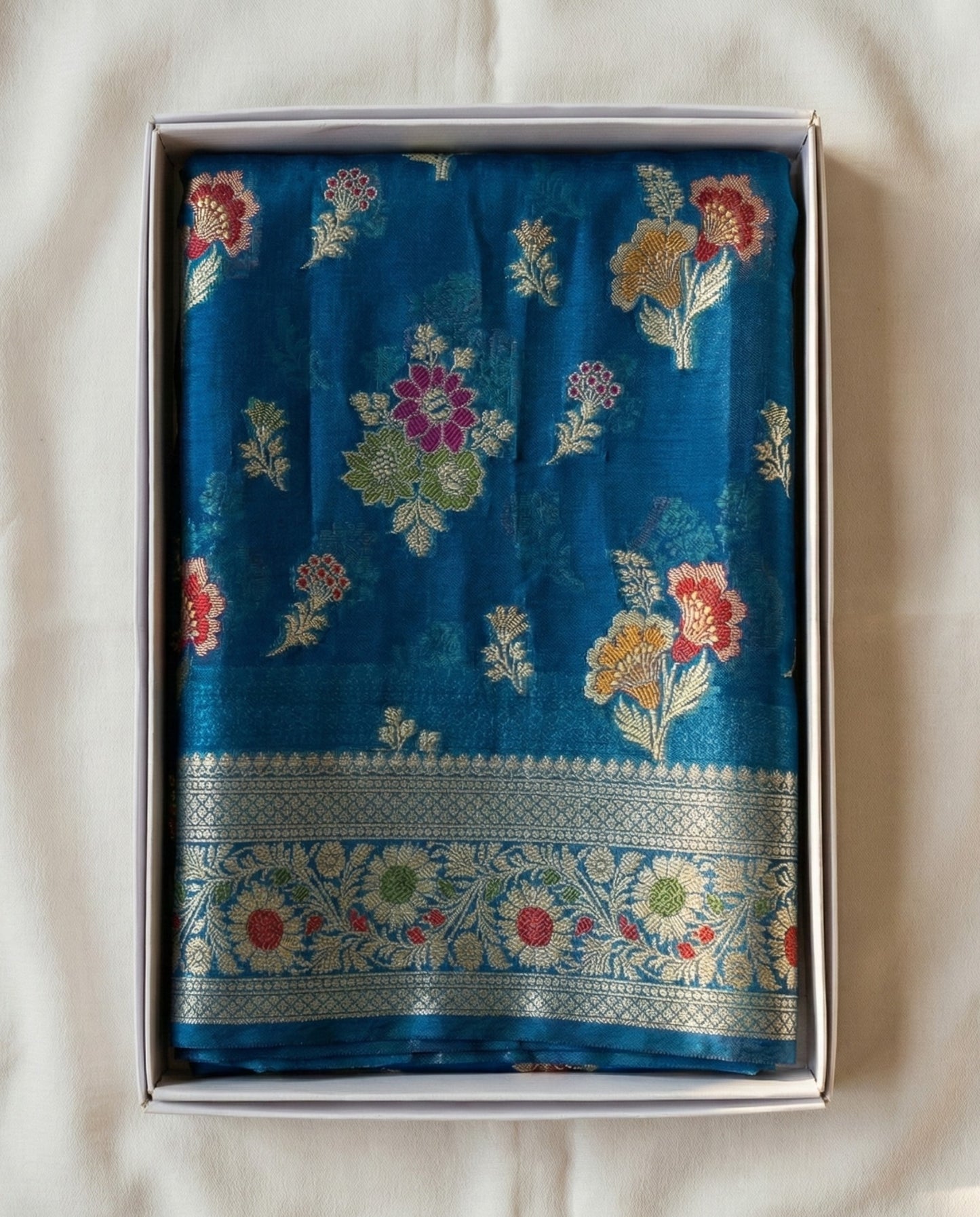 Priya - Teal Blue Banarasi Silk Saree with Floral Zari Border