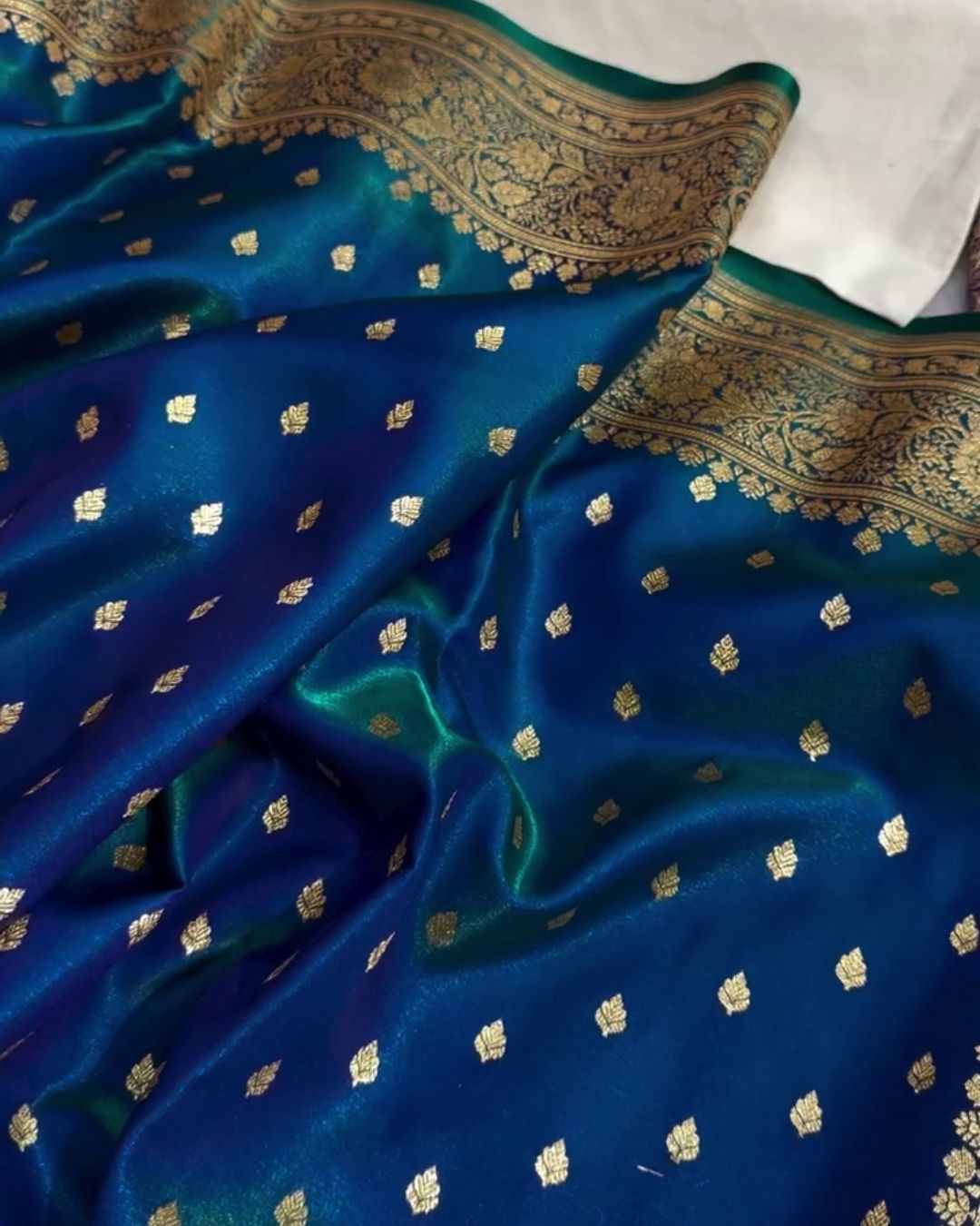 Amara - Teal Blue Banarasi Satin Saree with Zari Buti and Floral Border