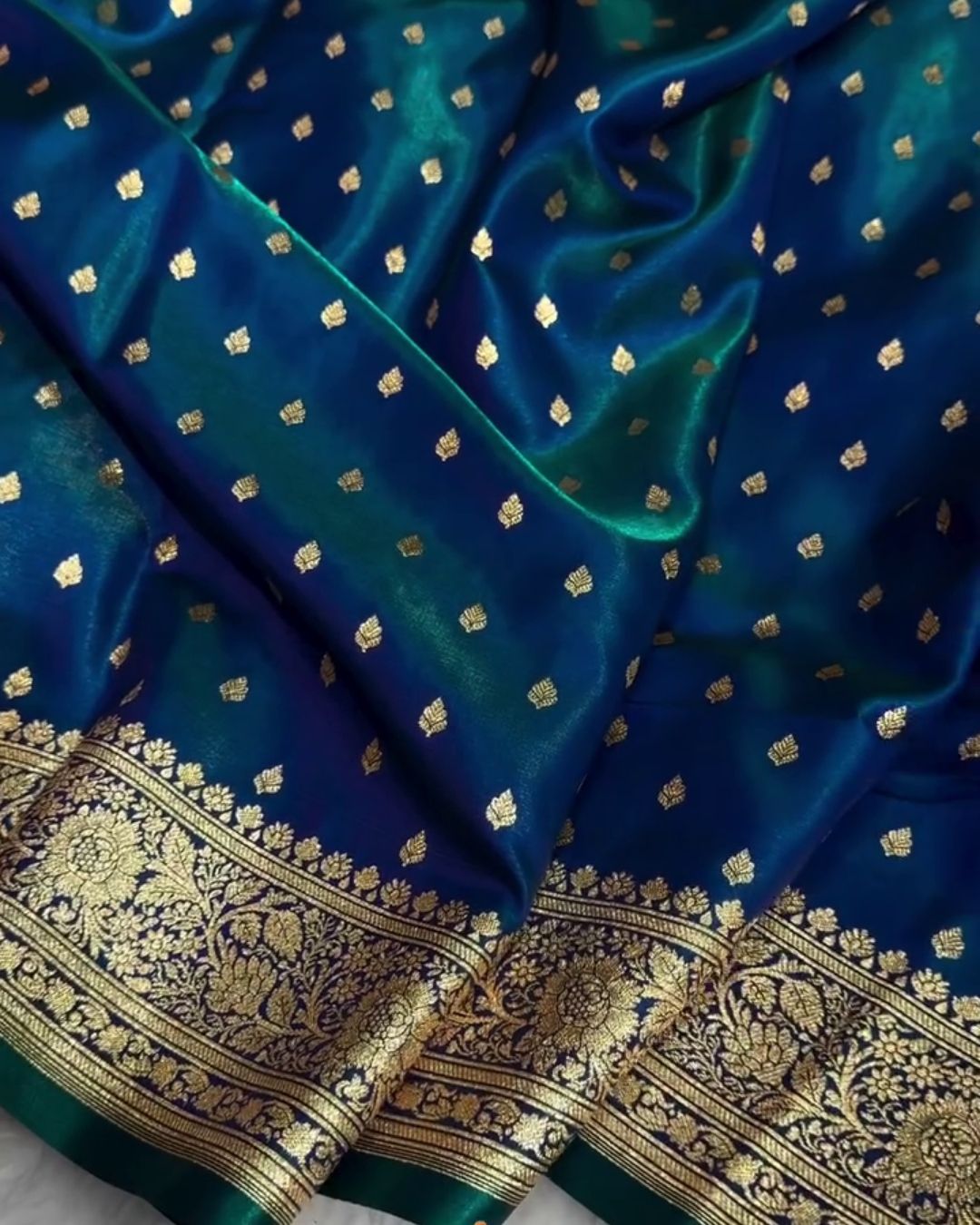 Amara - Teal Blue Banarasi Satin Saree with Zari Buti and Floral Border