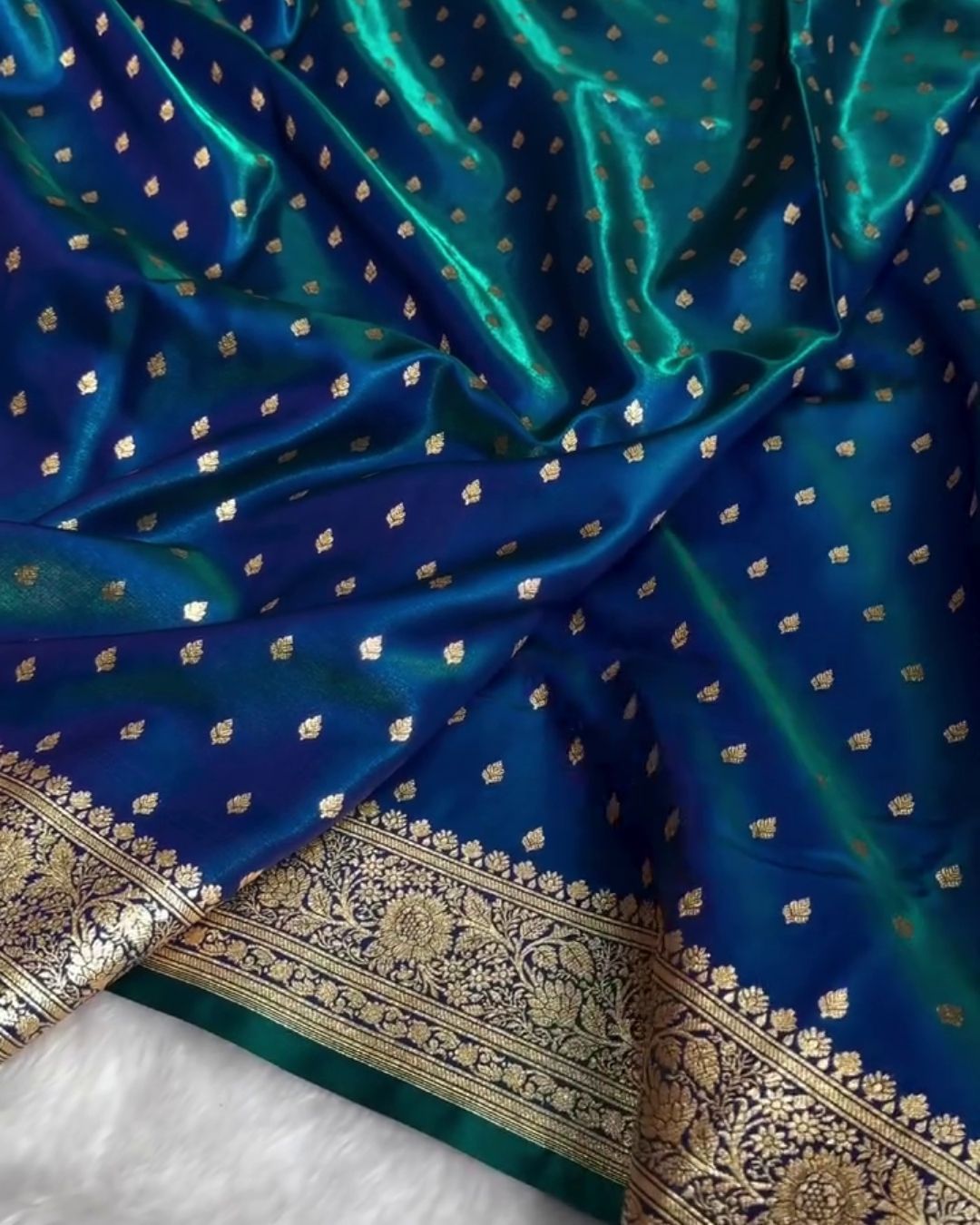 Amara - Teal Blue Banarasi Satin Saree with Zari Buti and Floral Border