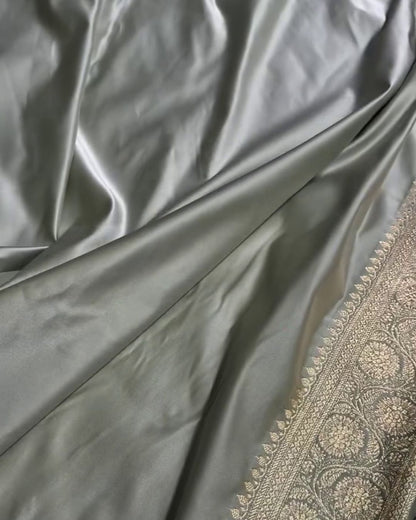 Mahika-Teal Banarasi Satin Saree with Zari Floral & Contrast Maroon Border