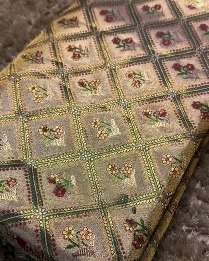 Akhila - Gold Semi Kanchipuram Saree with Floral Checks and Red Zari Border