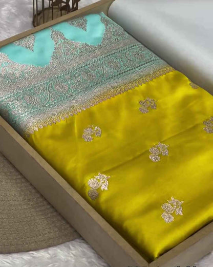 Rajalakshmi – Yellow Banarasi Mashru Satin Silk Saree with Aqua Blue Zari Border