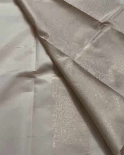 Ranjana – Off White Semi Brocade Soft Silk Saree with Floral Weave