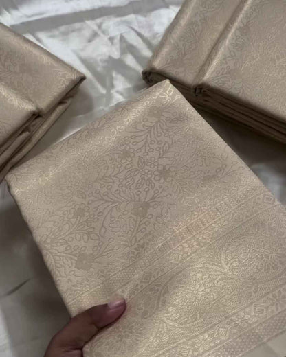 Ranjana – Off White Semi Brocade Soft Silk Saree with Floral Weave