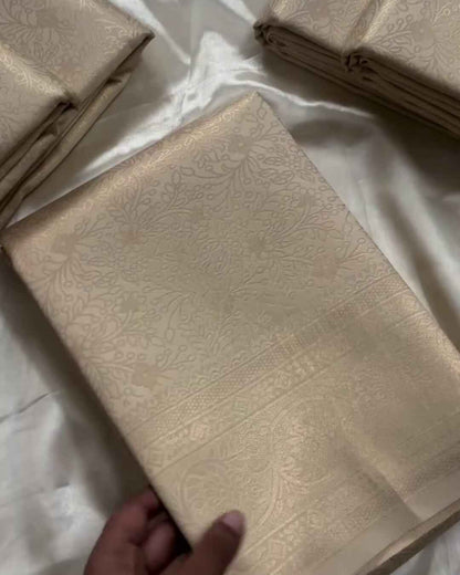 Ranjana – Off White Semi Brocade Soft Silk Saree with Floral Weave