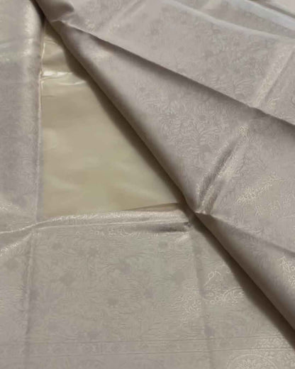 Ranjana – Off White Semi Brocade Soft Silk Saree with Floral Weave