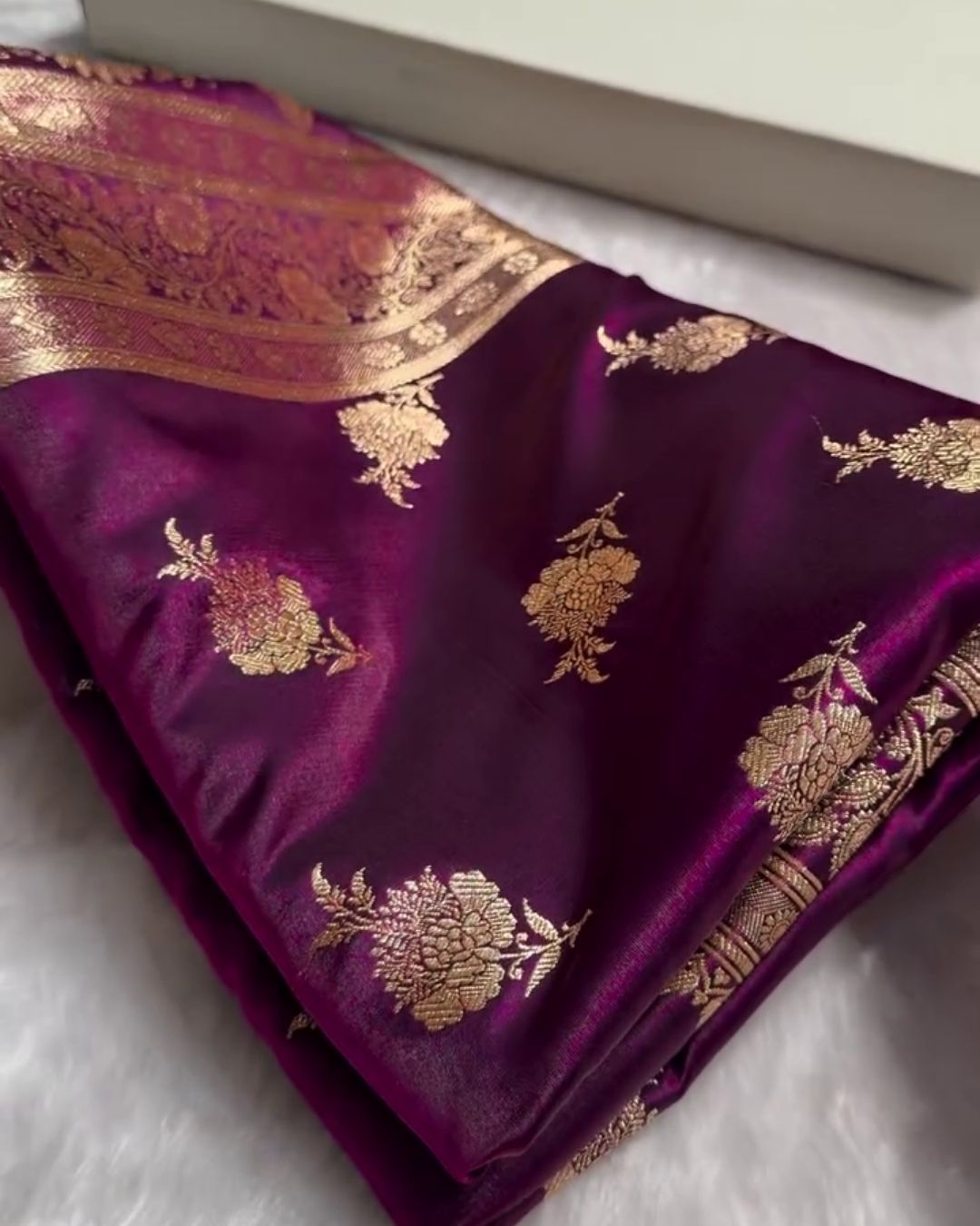 Satyabhama – Plum Satin Saree with Golden Zari Floral Weave