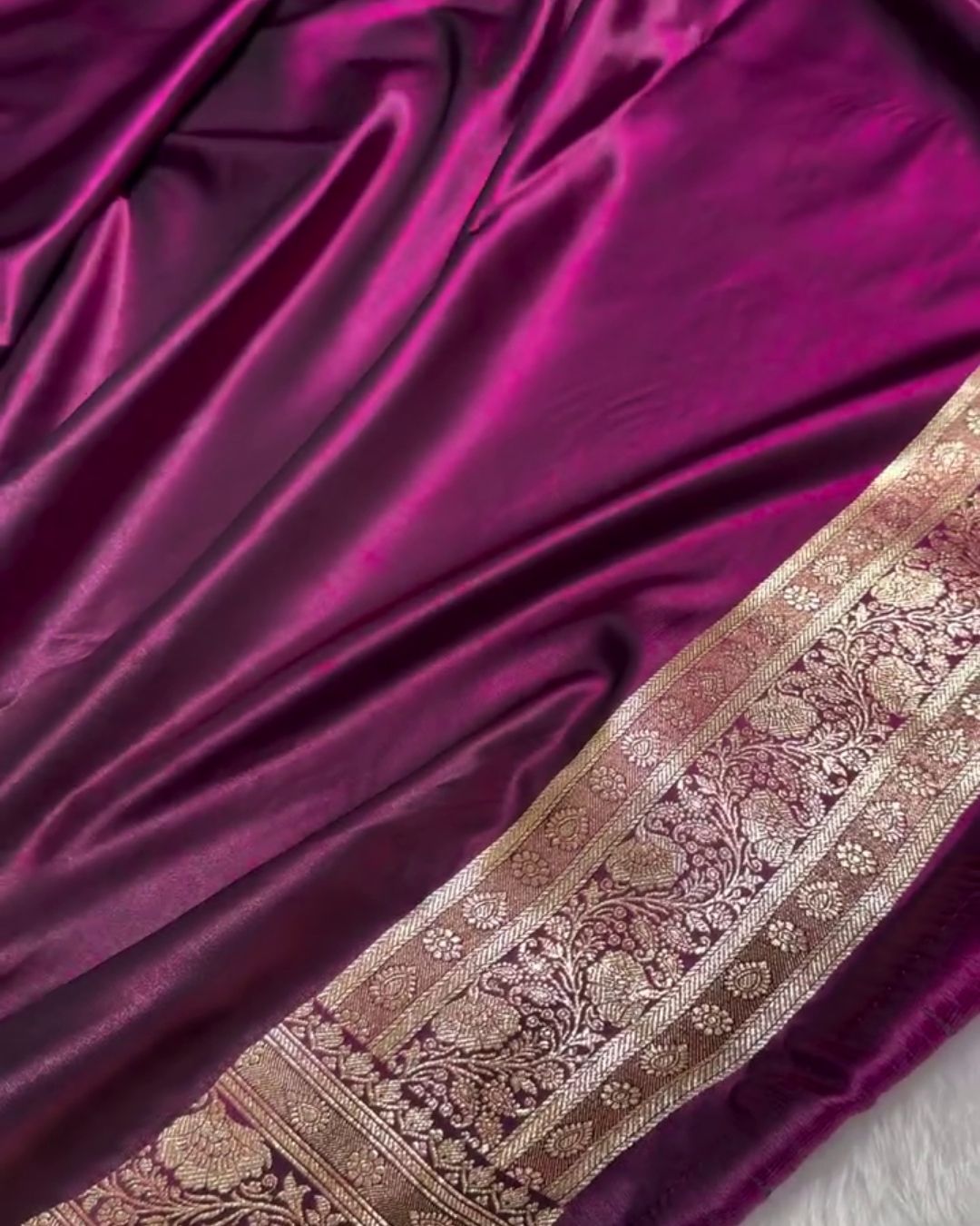 Satyabhama – Plum Satin Saree with Golden Zari Floral Weave