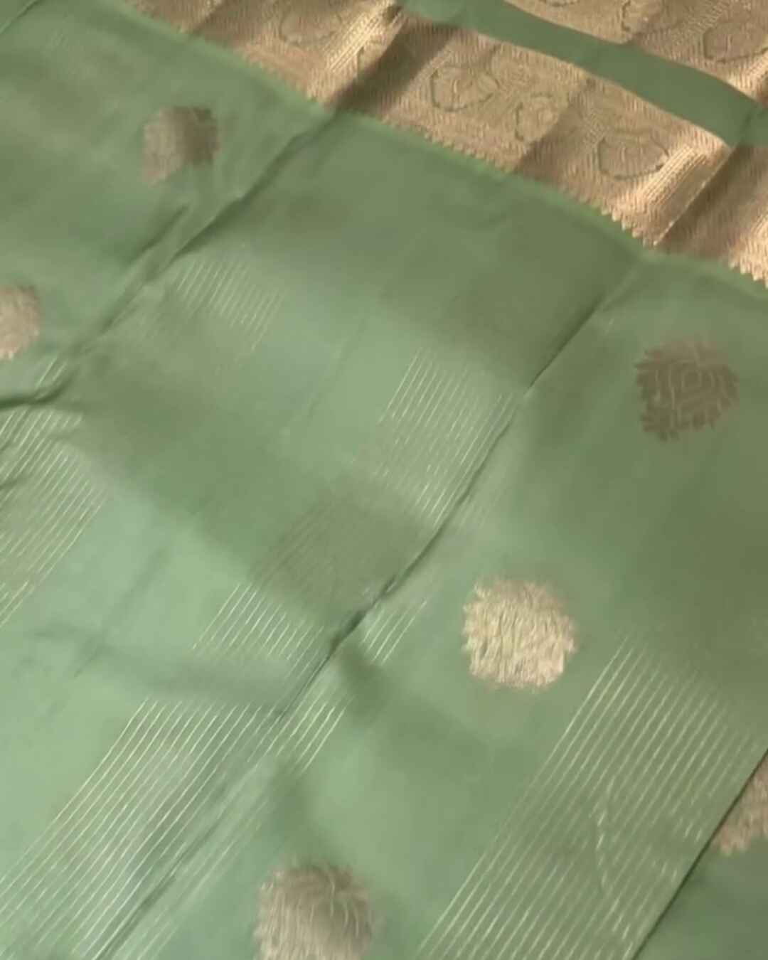 Savitri – Mint Green Kanjivaram Silk Saree with Zari Buta and Golden Border