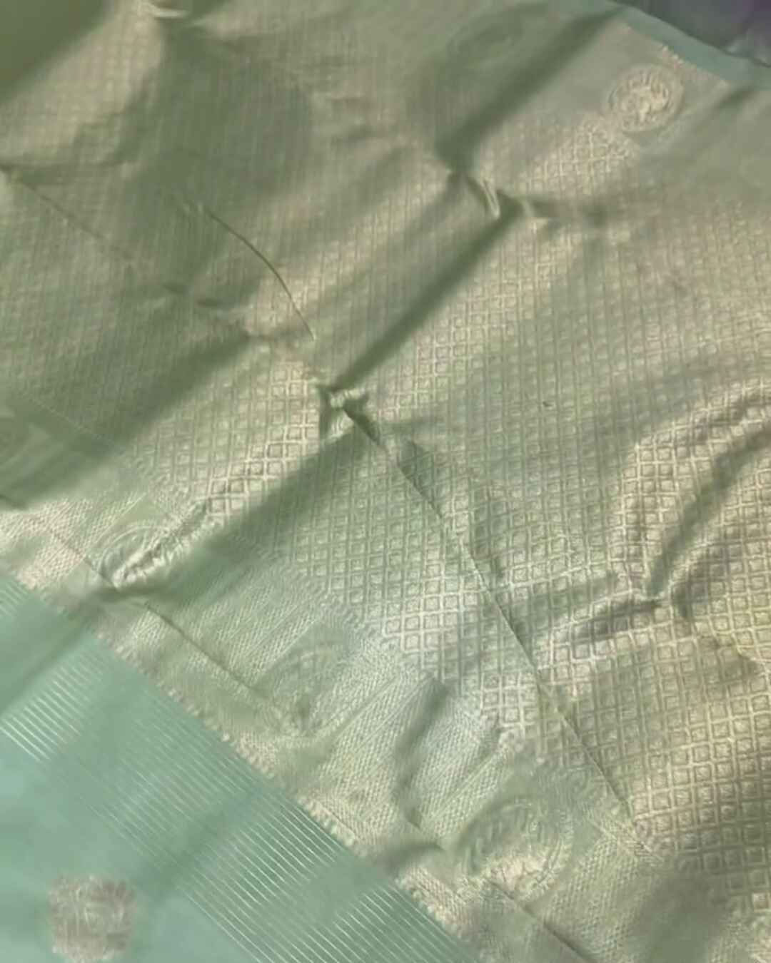 Savitri – Mint Green Kanjivaram Silk Saree with Zari Buta and Golden Border