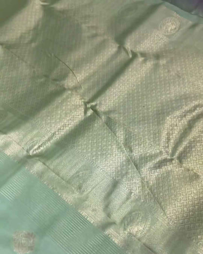 Savitri – Mint Green Kanjivaram Silk Saree with Zari Buta and Golden Border