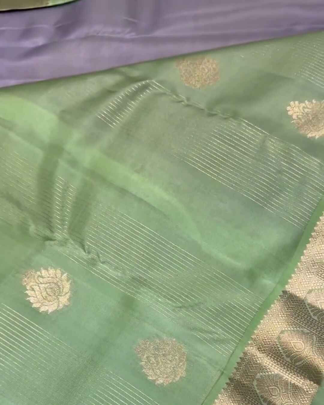 Savitri – Mint Green Kanjivaram Silk Saree with Zari Buta and Golden Border