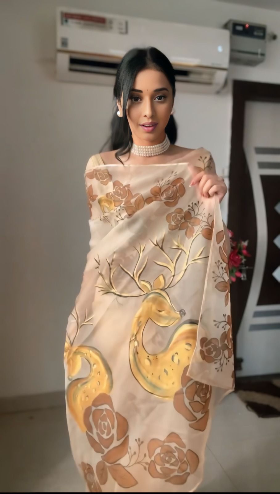 Nimara Beige Organza Saree with Hand-Painted Deer Motif