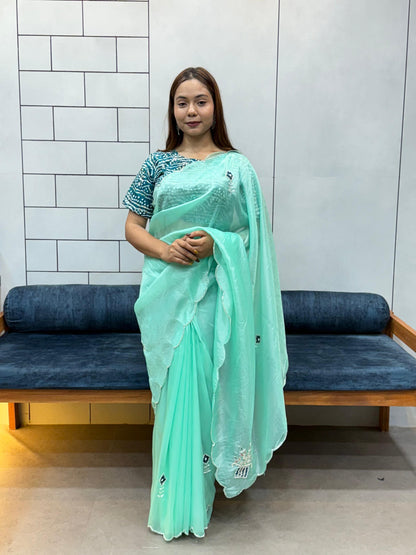 Suhani Sky Blue Chiffon Saree with Red Bandhej Blouse