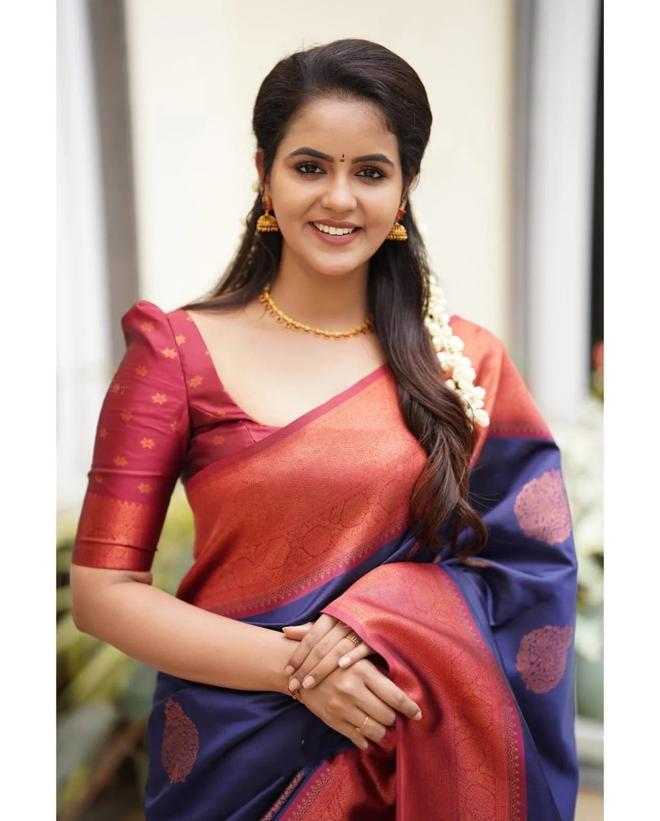 Kavya - NavyBlue Soft Banarasi Silk Saree with Copper Jacquard Buttas