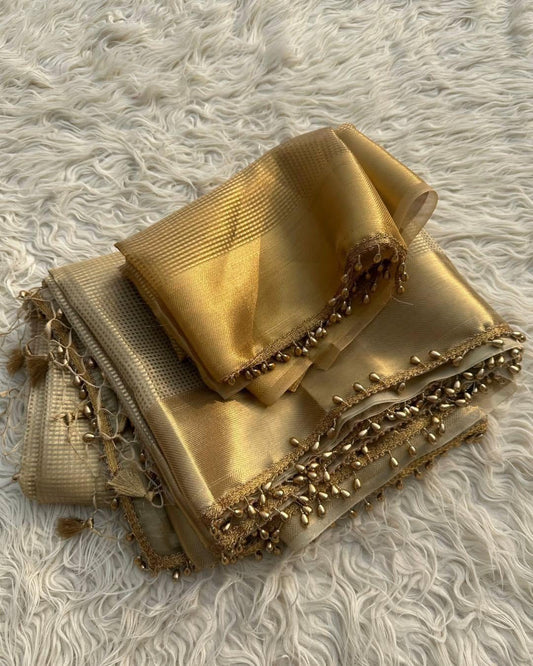 Savitri – Golden Tissue Silk Saree with Zari Weaving and Lace Work