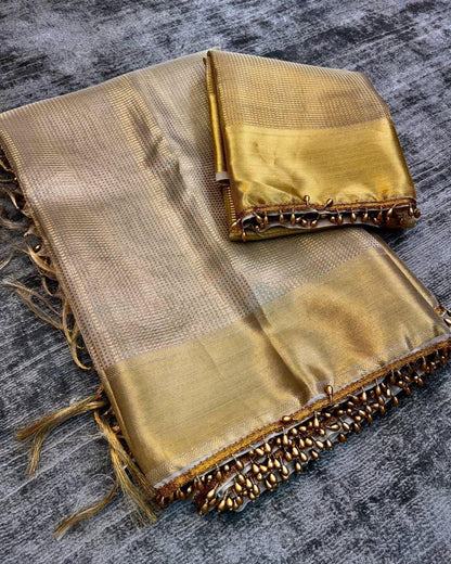 Savitri – Golden Tissue Silk Saree with Zari Weaving and Lace Work