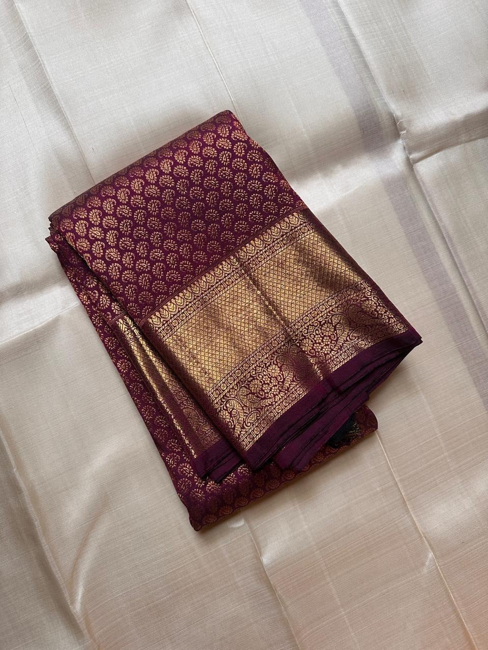 Kalpita – Wine Purple Banarasi Soft Silk Saree with Classic Zari Butti & Rich Border