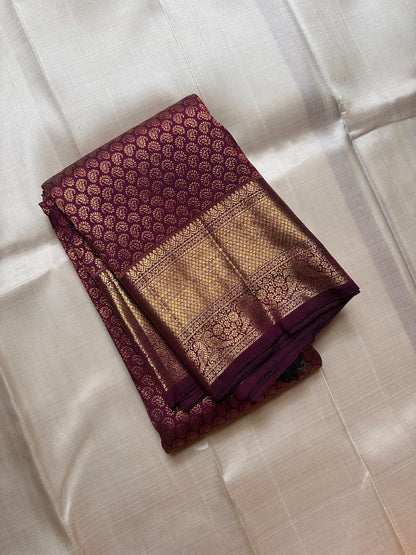 Kalpita – Wine Purple Banarasi Soft Silk Saree with Classic Zari Butti & Rich Border