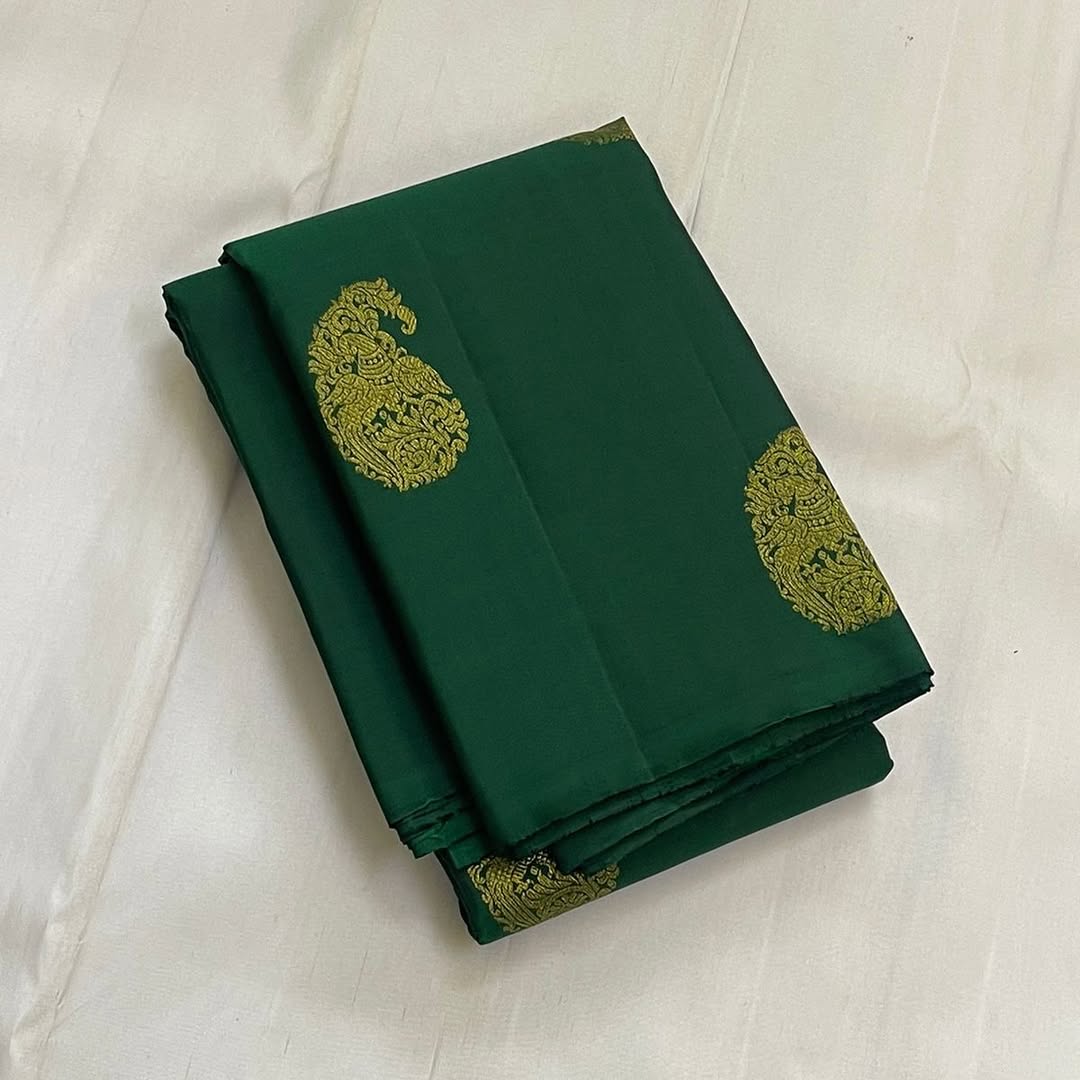 Renuka – Emerald Green Banarasi Soft Silk Saree with Royal Paisley Zari & Grand Pallu