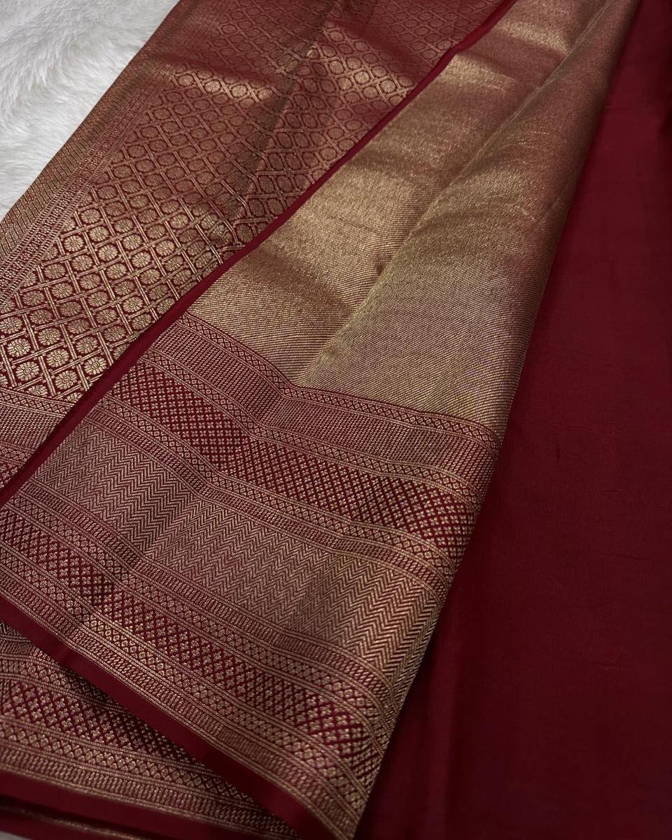 Meenal – Deep Maroon Banarasi Soft Silk Saree with Allover Zari Weave & Classic Border