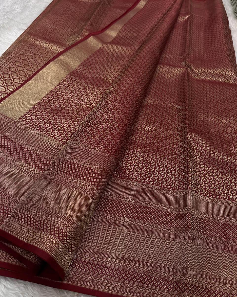 Meenal – Deep Maroon Banarasi Soft Silk Saree with Allover Zari Weave & Classic Border