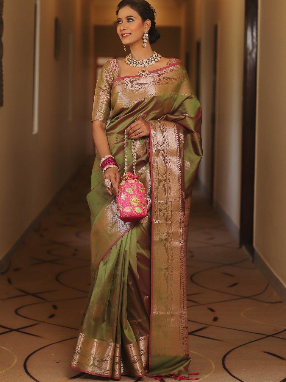 Vijayalakshmi - Green Kanjivaram Silk Saree with Gold Paisley Zari Border