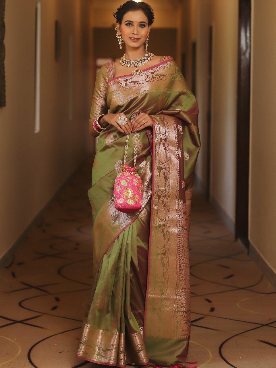 Vijayalakshmi - Green Kanjivaram Silk Saree with Gold Paisley Zari Border