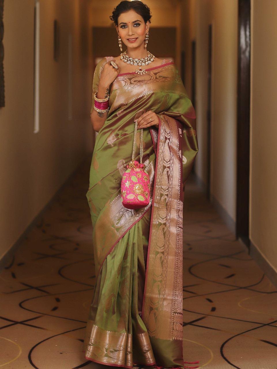 Vijayalakshmi - Green Kanjivaram Silk Saree with Gold Paisley Zari Border