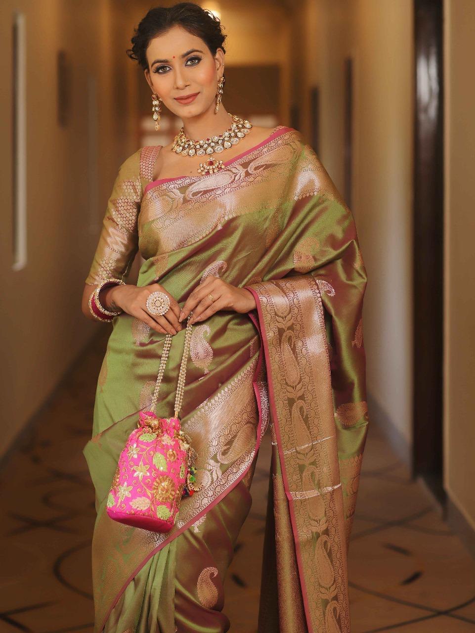 Vijayalakshmi - Green Kanjivaram Silk Saree with Gold Paisley Zari Border