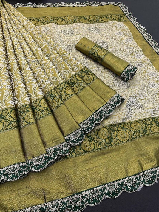 Vasundi - Green Kanjivaram Silk Saree with Royal Blue Zari Border